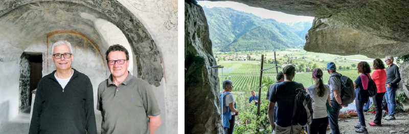 v. l. Kunsthistoriker Martin Laimer und der Archäologe Hubert Steiner; Blick aus dem Felsendach von Neuräutl in Naturns. Hier hatten sich schon die ersten vorgeschichtlichen Siedler niedergelassen. Die Fundstücke, die hier gemacht wurden (Klingen, Kratzer, Schaber aus Feuerstein) stammen aus der frühen Mittelsteinzeit, 9/8 Jahrtausend vor Christus. Die Fundstelle wurde 1958 von Luis Oberrauch entdeckt und gilt als eine der ältesten Fundstellen Südtirols.