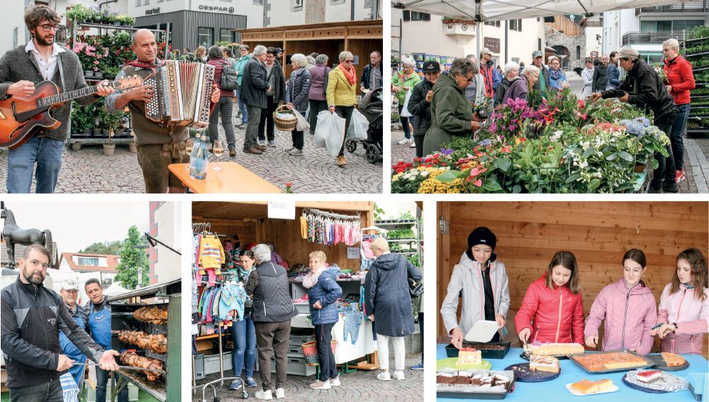 Geschäftiges Treiben am Schludernser Rathausplatz im Ortskern von Schluderns