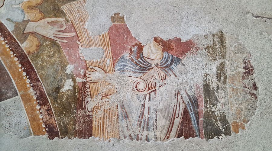 Kain mit der Garbe in der Hand und darüber die fragende Hand (Archiv Heinrich Moriggl)